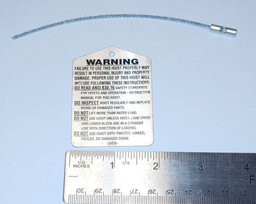 Metal warning tag #22688301 with eye hold for hanging wire. Suitable for equipment or remote control units.